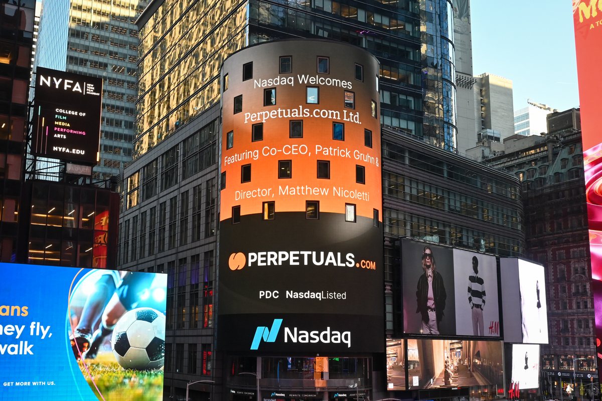 Nasdaq Times Square tower display reading: Nasdaq Welcomes Perpetuals.com Ltd., featuring Co-CEO Patrick Gruhn and Director Matthew Nicoletti. PDC, Nasdaq Listed.